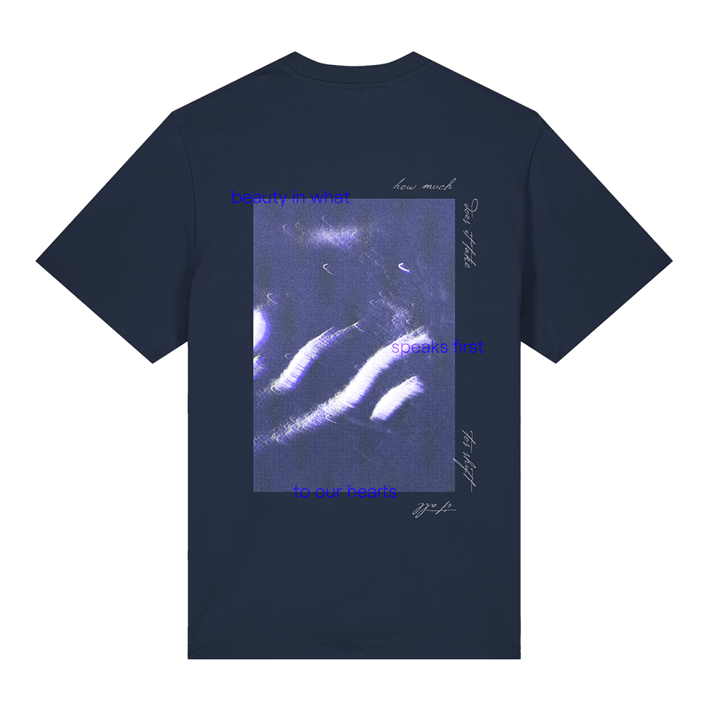 Navy blue t-shirt with a graphic design and text on the back against a white background